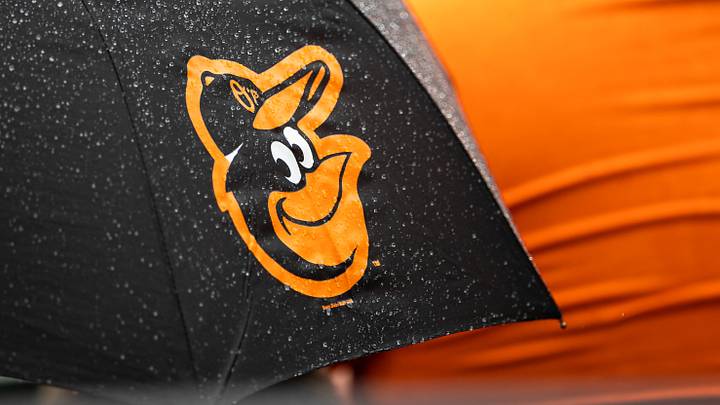 Aug 22, 2021; Baltimore, Maryland, USA; A Baltimore Orioles logo is seen on an umbrella during the game between the Baltimore Orioles and the Atlanta Braves at Oriole Park at Camden Yards. Mandatory Credit: Scott Taetsch-USA TODAY Sports