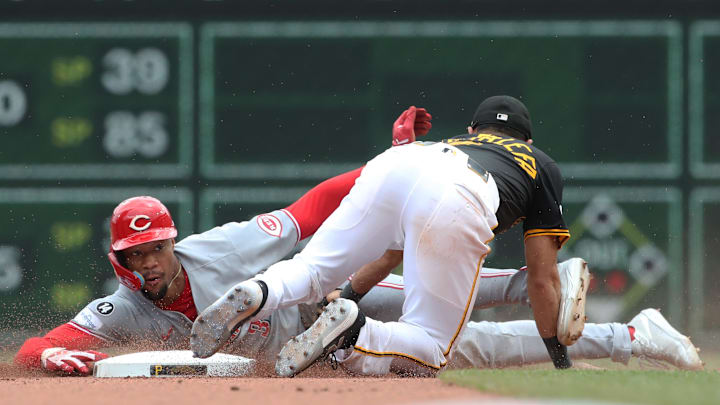 May 21, 2025; Pittsburgh, Pennsylvania, USA; Pittsburgh Pirates shortstop Isiah Kiner-Falefa (7) tags Cincinnati Reds outfielder Will Benson (30) out at second base on a steal attempt during the eighth inning at PNC Park. Mandatory Credit: Charles LeClaire-Imagn Images May 21, 2025; Pittsburgh, Pennsylvania, USA; Pittsburgh Pirates shortstop Isiah Kiner-Falefa (7) tags Cincinnati Reds outfielder Will Benson (30) out at second base on a steal attempt during the eighth inning at PNC Park. Mandatory Credit: Charles LeClaire-Imagn Images