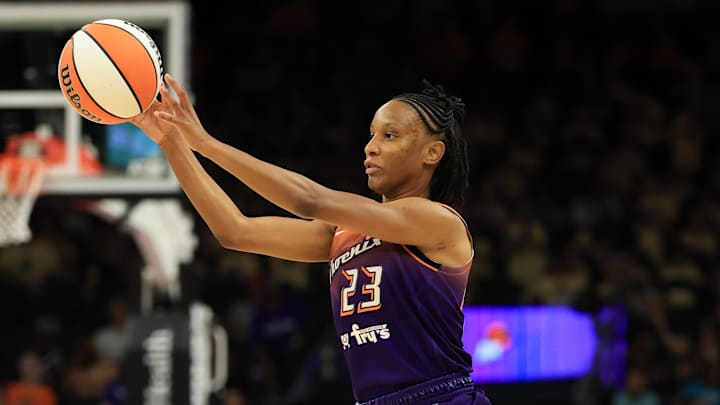 Jul 9, 2025; Phoenix, Arizona, USA; Phoenix Mercury guard Kiana Williams (23) against the Minnesota Lynx during the first half at PHX Arena. Mandatory Credit: Mark J. Rebilas-Imagn Images