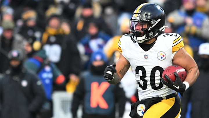 Jan 15, 2024; Orchard Park, New York, USA; Pittsburgh Steelers running back Jaylen Warren (30) runs