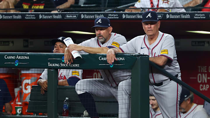 Atlanta Braves manager Brian Snitker (right) and bench coach Walt Weiss