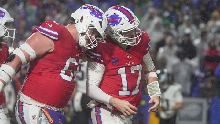 Buffalo Bills center Connor McGovern celebrates with Buffalo Bills quarterback Josh Allen’s touchdown, the team’s first of the game in the fourth quarter against the Philadelphia Eagles at Highmark Stadium in Orchard Park on Dec. 28, 2025. Buffalo Bills center Connor McGovern celebrates with Buffalo Bills quarterback Josh Allen’s touchdown, the team’s first of the game in the fourth quarter against the Philadelphia Eagles at Highmark Stadium in Orchard Park on Dec. 28, 2025.