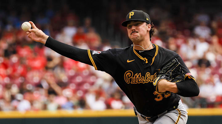 Pittsburgh Pirates starting pitcher Paul Skenes (30) pitches against the Cincinnati Reds in the third inning at Great American Ball Park. 