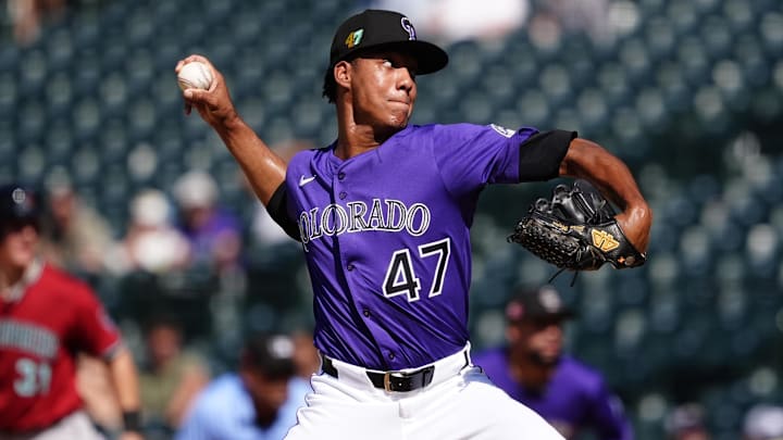 Aug 17, 2025; Denver, Colorado, USA; Colorado Rockies relief pitcher Juan Mejia (47) delivers a pitch in the ninth inning against the Arizona Diamondbacks at Coors Field