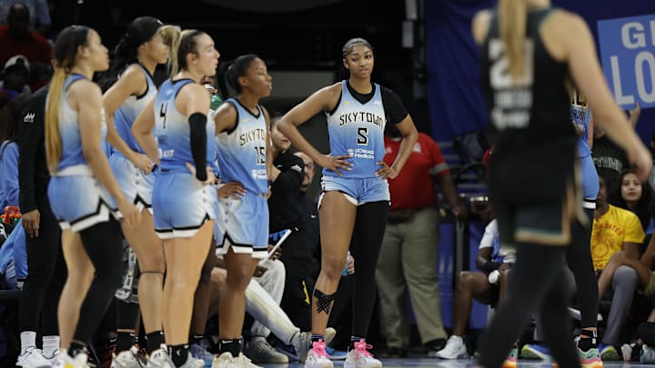 Jul 13, 2024; Chicago, Illinois, USA; Chicago Sky forward Angel Reese (5) looks on during the second half of a WNBA game against the New York Liberty at Wintrust Arena. Mandatory Credit: Kamil Krzaczynski-Imagn Images Jul 13, 2024; Chicago, Illinois, USA; Chicago Sky forward Angel Reese (5) looks on during the second half of a WNBA game against the New York Liberty at Wintrust Arena. Mandatory Credit: Kamil Krzaczynski-Imagn Images