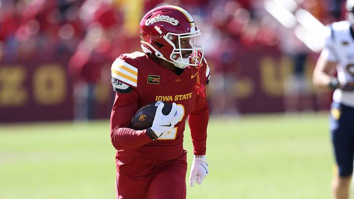 Oct 3, 2026; Ames, Iowa, USA; Iowa State Cyclones wide receiver Cody Jackson (2) catches a touchdown pass from Iowa State Cyclones running back Aiden Flora (21) against the West Virginia Mountaineers at Jack Trice Stadium. Mandatory Credit: Reese Strickland-Imagn Images Oct 3, 2026; Ames, Iowa, USA; Iowa State Cyclones wide receiver Cody Jackson (2) catches a touchdown pass from Iowa State Cyclones running back Aiden Flora (21) against the West Virginia Mountaineers at Jack Trice Stadium. Mandatory Credit: Reese Strickland-Imagn Images