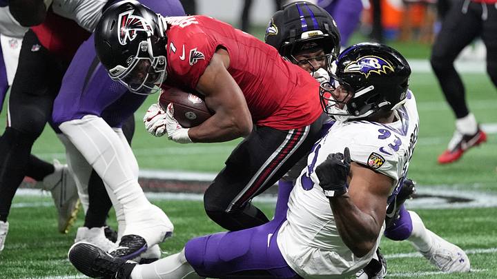 Oct 11, 2026; Atlanta, Georgia, USA; Baltimore Ravens safety Malaki Starks (24) and defensive tackle Calais Campbell (93) tackle Atlanta Falcons running back Bijan Robinson (7) during the fourth quarter at Mercedes-Benz Stadium. Mandatory Credit: Dale Zanine-Imagn Images Oct 11, 2026; Atlanta, Georgia, USA; Baltimore Ravens safety Malaki Starks (24) and defensive tackle Calais Campbell (93) tackle Atlanta Falcons running back Bijan Robinson (7) during the fourth quarter at Mercedes-Benz Stadium. Mandatory Credit: Dale Zanine-Imagn Images