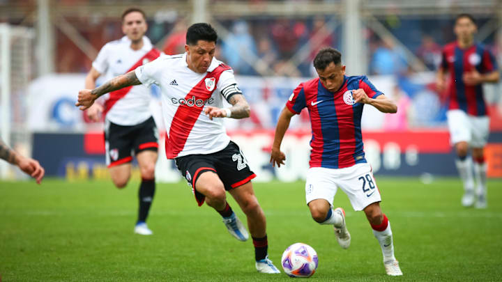 Enzo Perez (L) of River Plate and Nahuel Barrios (R) of San... Enzo Perez (L) of River Plate and Nahuel Barrios (R) of San...