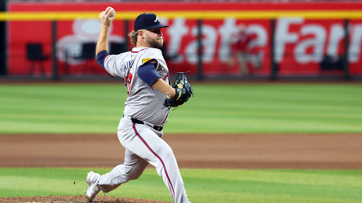 Jul 9, 2024; Phoenix, Arizona, USA; Atlanta Braves pitcher A.J. Minter against the Arizona Diamondbacks at Chase Field. Mandatory Credit: Mark J. Rebilas-Imagn Images