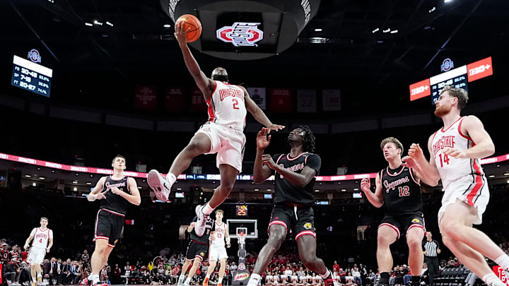 Ohio State Buckeyes guard Bruce Thornton (2) shoots over IU Indy Jaguars guard Jaxon Edwards (0) during the NCAA men's basketball game at Value City Arena in Columbus on Nov. 3, 2025. Ohio State won the season opener 118-102.