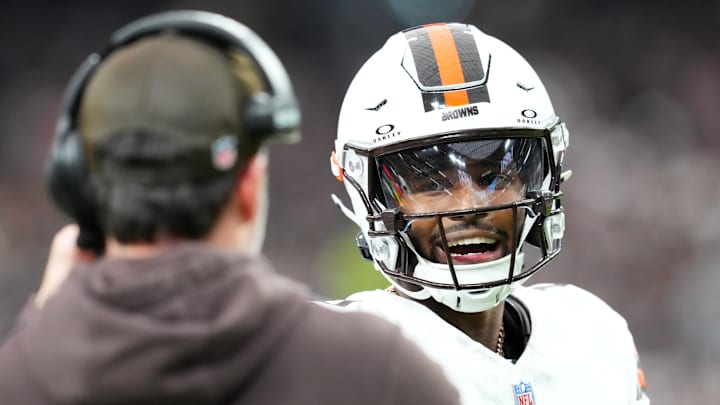 Nov 23, 2025; Paradise, Nevada, USA; Cleveland Browns quarterback Shedeur Sanders (12) talks to head coach Kevin Stefanski in the first half against the Las Vegas Raiders  at Allegiant Stadium. Mandatory Credit: Stephen R. Sylvanie-Imagn Images