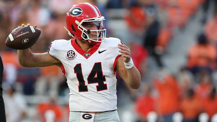 Oct 11, 2025; Auburn, Alabama, USA;  Georgia Bulldogs quarterback Gunner Stockton (14) warms up before the game against the Auburn Tigers at Jordan-Hare Stadium. Mandatory Credit: John Reed-Imagn Images