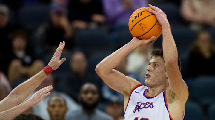 Evansville   s Ben Humrichous (13) takes a shot as the University of Evansville Purple Aces play the Miami (Ohio) University Redhawks at Ford Center in Evansville, Ind., Monday, Nov. 6, 2023.