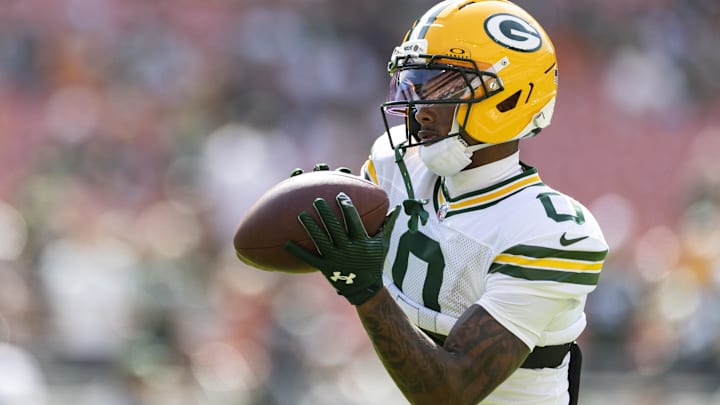 Sep 21, 2025; Cleveland, Ohio, USA; Green Bay Packers wide receiver Matthew Golden (0) catches the ball during warm ups before the game against the Cleveland Browns at Huntington Bank Field. 