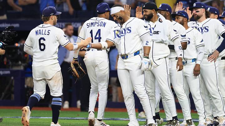 Oct 3, 2026; St. Petersburg, Florida, USA; Tampa Bay Rays shortstop Taylor Walls (6) high fives designated hitter Yandy Diaz (2) after defeating the New York Yankees in game one of the ALDS for the 2026 MLB Playoffs at Tropicana Field. Mandatory Credit: Kim Klement Neitzel-Imagn Images Oct 3, 2026; St. Petersburg, Florida, USA; Tampa Bay Rays shortstop Taylor Walls (6) high fives designated hitter Yandy Diaz (2) after defeating the New York Yankees in game one of the ALDS for the 2026 MLB Playoffs at Tropicana Field. Mandatory Credit: Kim Klement Neitzel-Imagn Images