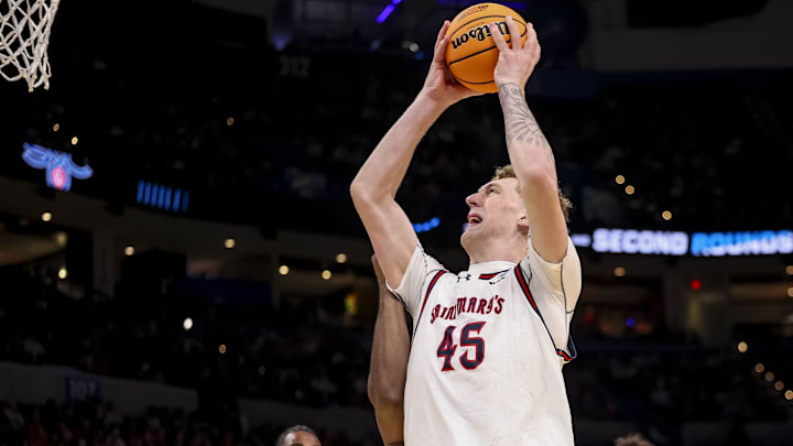 Mar 19, 2026; Oklahoma City, OK, USA; Saint Mary's (CA) Gaels center Andrew McKeever (45) attempts a layup during a first round game of the men's 2026 NCAA Tournament at Paycom Center. Mandatory Credit: William Purnell-Imagn Images