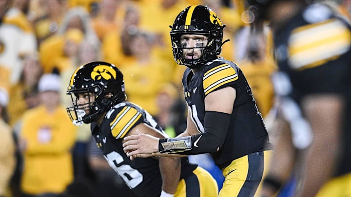 Oct 18, 2025; Iowa City, Iowa, USA; Iowa Hawkeyes quarterback Mark Gronowski (11) looks on against the Penn State Nittany Lions during the second quarter at Kinnick Stadium. Mandatory Credit: Jeffrey Becker-Imagn Images