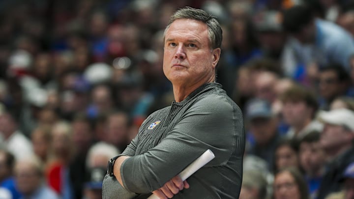 Nov 19, 2024; Lawrence, Kansas, USA; Kansas Jayhawks head coach Bill Self reacts during the second half against the North Carolina-Wilmington Seahawks at Allen Fieldhouse. Mandatory Credit: Jay Biggerstaff-Imagn Images Nov 19, 2024; Lawrence, Kansas, USA; Kansas Jayhawks head coach Bill Self reacts during the second half against the North Carolina-Wilmington Seahawks at Allen Fieldhouse. Mandatory Credit: Jay Biggerstaff-Imagn Images