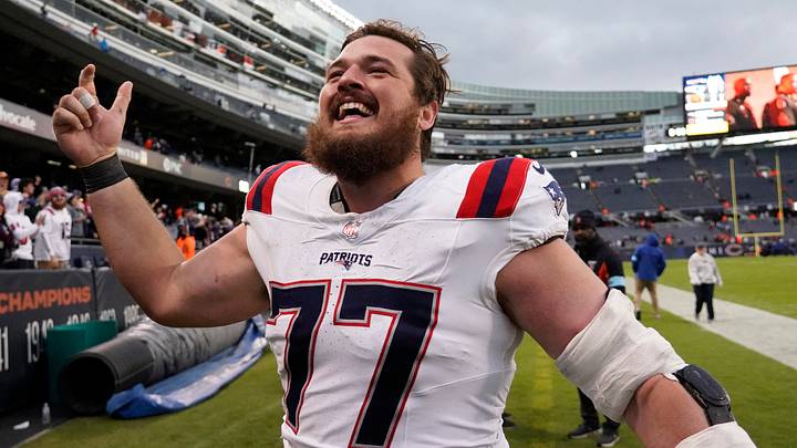 Nov 10, 2024; Chicago, Illinois, USA; New England Patriots center Ben Brown (77) celebrates the win against the Chicago Bears at Soldier Field. Mandatory Credit: David Banks-Imagn Images Nov 10, 2024; Chicago, Illinois, USA; New England Patriots center Ben Brown (77) celebrates the win against the Chicago Bears at Soldier Field. Mandatory Credit: David Banks-Imagn Images