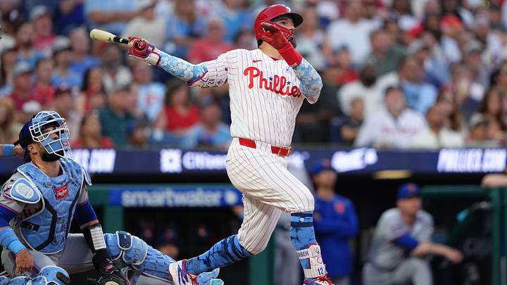 Jun 21, 2026; Philadelphia, Pennsylvania, USA; Philadelphia Phillies designated hitter Kyle Schwarber (12) hits a three-run home run against the New York Mets in the second inning at Citizens Bank Park.
