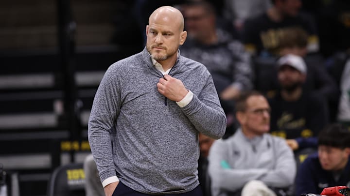 Penn State Nittany Lions wrestling coach Cael Sanderson watches his team wrestle the Iowa Hawkeyes at Carver-Hawkeye Arena. 