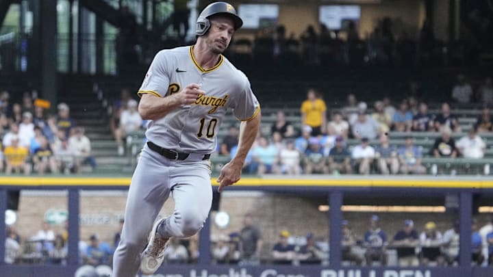 Jun 23, 2025; Milwaukee, Wisconsin, USA; Pittsburgh Pirates outfielder Bryan Reynolds (10) runs to third base and then scores a run against the Milwaukee Brewers in the first i  at American Family Field. Mandatory Credit: Michael McLoone-Imagn Images