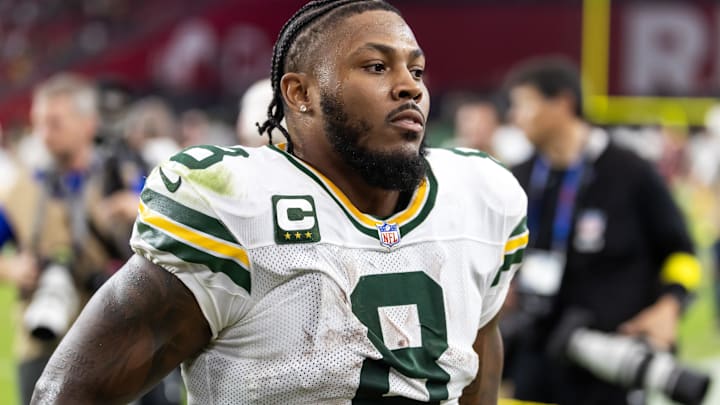 Oct 19, 2025; Glendale, Arizona, USA; Green Bay Packers running back Josh Jacobs (8) against the Arizona Cardinals at State Farm Stadium. Mandatory Credit: Mark J. Rebilas-Imagn Images