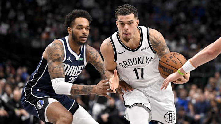 Dec 12, 2025; Dallas, Texas, USA; Brooklyn Nets forward Michael Porter Jr. (17) moves the ball past Dallas Mavericks forward P.J. Washington (25) during the game between the Mavericks and the Nets at the American Airlines Center. Mandatory Credit: Jerome Miron-Imagn Images Dec 12, 2025; Dallas, Texas, USA; Brooklyn Nets forward Michael Porter Jr. (17) moves the ball past Dallas Mavericks forward P.J. Washington (25) during the game between the Mavericks and the Nets at the American Airlines Center. Mandatory Credit: Jerome Miron-Imagn Images