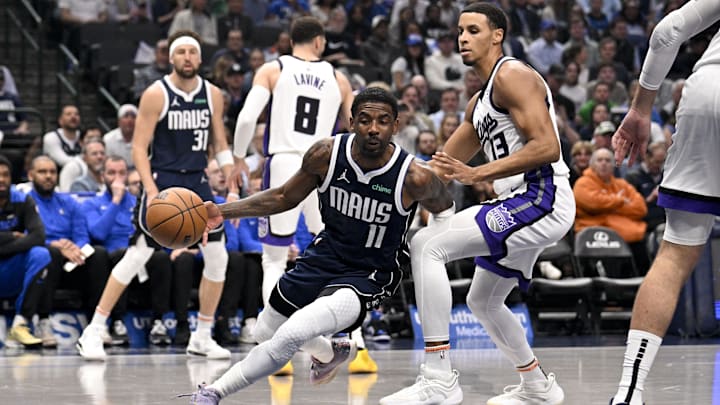 Dallas Mavericks guard Irving drives to the basket past Sacramento Kings forward Murray during the first quarter at the American Airlines Center. 