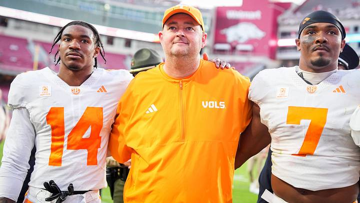 Tennessee defensive back Kayin Lee (14), Tennessee coach Josh Heupel and Tennessee linebacker Arion Carter (7) after a college football game between Tennessee and Arkansas at Donald W. Reynolds Razorback Stadium in Fayetteville, Ark., on Oct. 10, 2026. Tennessee defensive back Kayin Lee (14), Tennessee coach Josh Heupel and Tennessee linebacker Arion Carter (7) after a college football game between Tennessee and Arkansas at Donald W. Reynolds Razorback Stadium in Fayetteville, Ark., on Oct. 10, 2026.