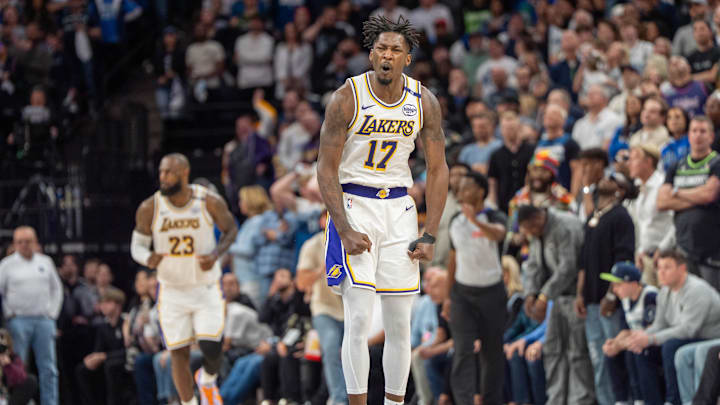 Apr 27, 2025; Minneapolis, Minnesota, USA; Los Angeles Lakers forward Dorian Finney-Smith (17) celebrates after scoring a three pointer agains the Minnesota Timberwolves in the fourth quarter during game four of first round for the 2025 NBA Playoffs at Target Center. Mandatory Credit: Matt Blewett-Imagn Images