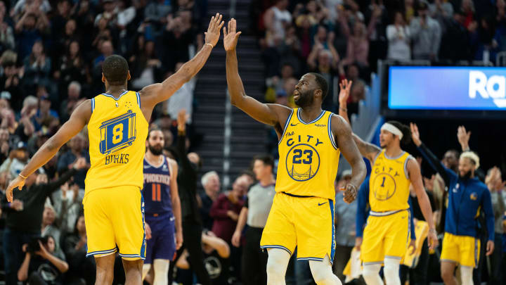 Dec 27, 2019; San Francisco, California, USA;  Golden State Warriors guard Alec Burks (8) and Golden State Warriors forward Draymond Green (23) celebrate after the score against the Phoenix Suns during the fourth quarter at Chase Center. Mandatory Credit: Neville E. Guard-USA TODAY Sports