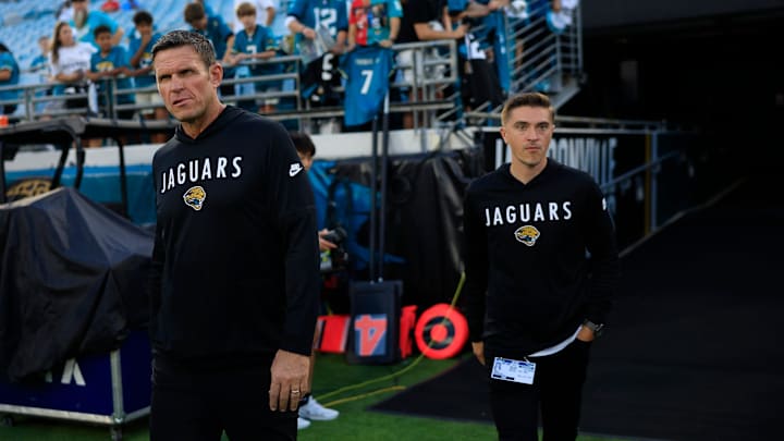 Jacksonville Jaguars Executive Vice President of football operations Tony Boselli, left, and General Manager James Gladstone walks on the field before an NFL football matchup at EverBank Stadium, Monday, Oct. 6, 2025, in Jacksonville, Fla. [Corey Perrine/Florida Times-Union]