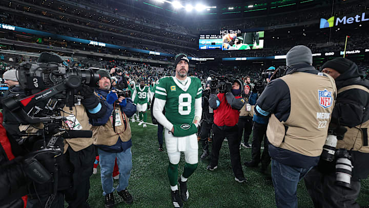 New York Jets quarterback Aaron Rodgers (8) walks off the field after what figures to be his final game with the team.