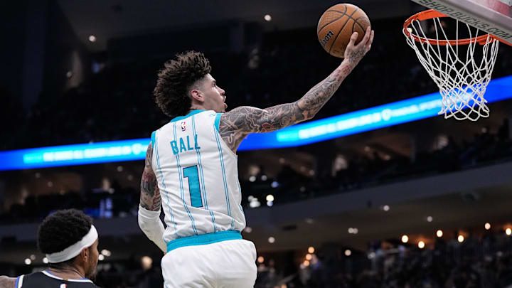 Nov 14, 2025; Milwaukee, Wisconsin, USA;  Charlotte Hornets guard LaMelo Ball (1) shoots during the second quarter against the Milwaukee Bucks at Fiserv Forum. Mandatory Credit: Jeff Hanisch-Imagn Images