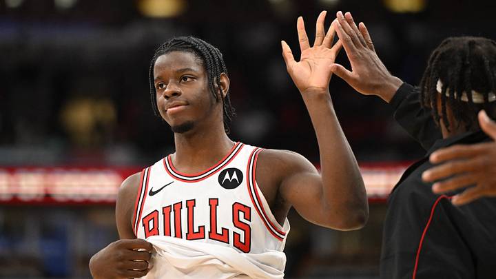 Oct 9, 2026; Chicago, Illinois, USA; Chicago Bulls forward Caleb Wilson (8) high fives a teammate after missing a basket against the Memphis Grizzlies at the end of the game at United Center.