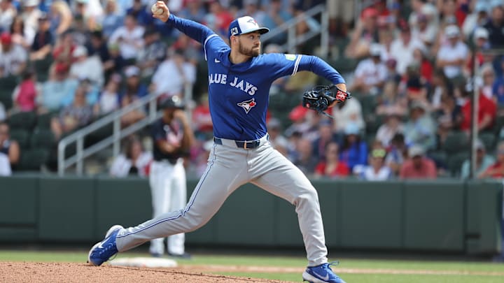 Mar 1, 2025; North Port, Florida, USA;  Toronto Blue Jays pitcher Zach Pop (56) throws a pitch against the Atlanta Braves during the third inning at CoolToday Park. Mandatory Credit: Kim Klement Neitzel-Imagn Images