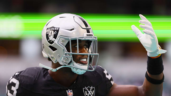 Nov 17, 2024; Miami Gardens, Florida, USA; Las Vegas Raiders linebacker Amari Gainer (53) reacts from the bench against the Miami Dolphins during the fourth quarter at Hard Rock Stadium. Mandatory Credit: Sam Navarro-Imagn Images Nov 17, 2024; Miami Gardens, Florida, USA; Las Vegas Raiders linebacker Amari Gainer (53) reacts from the bench against the Miami Dolphins during the fourth quarter at Hard Rock Stadium. Mandatory Credit: Sam Navarro-Imagn Images