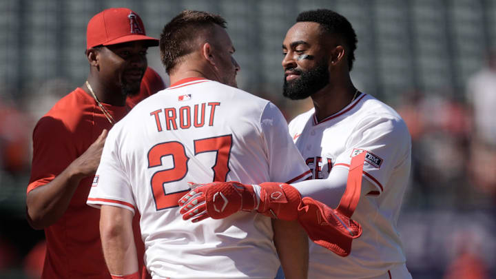 Apr 20, 2025; Anaheim, California, USA; Los Angeles Angels center fielder Jo Adell (7) celebrates with right fielder Mike Trout (27) after hitting a walk-off double against the San Francisco Giants at Angel Stadium. Mandatory Credit: Kirby Lee-Imagn Images