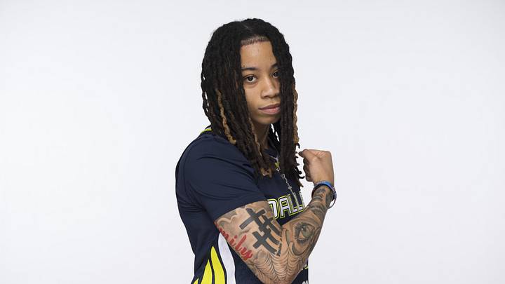 Apr 27, 2026; Arlington, TX, USA;  Dallas Wings guard JJ Quinerly (11) poses for a photo during the 2026 Dallas Wings media day at College Park Center. Mandatory Credit: Jerome Miron-Imagn Images