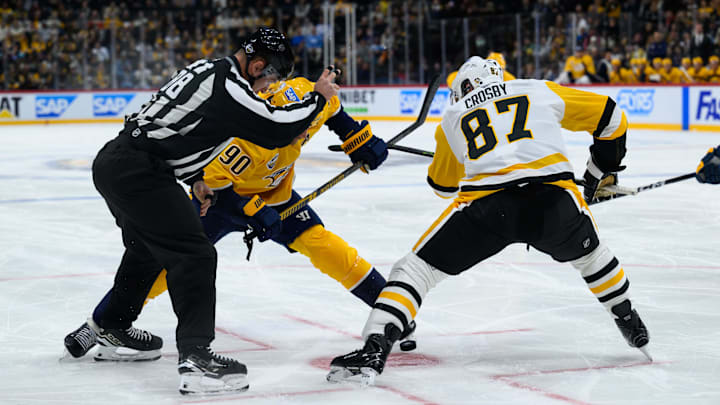 Nov 14, 2025; Stockholm, SWEDEN; Pittsburgh Penguins center Sidney Crosby (87) takes a face off against Nashville Predators center Ryan O'Reilly (90) in a Global Series ice hockey game at Avicii Arena. Mandatory Credit: Per Haljestam-Imagn Images Nov 14, 2025; Stockholm, SWEDEN; Pittsburgh Penguins center Sidney Crosby (87) takes a face off against Nashville Predators center Ryan O'Reilly (90) in a Global Series ice hockey game at Avicii Arena. Mandatory Credit: Per Haljestam-Imagn Images