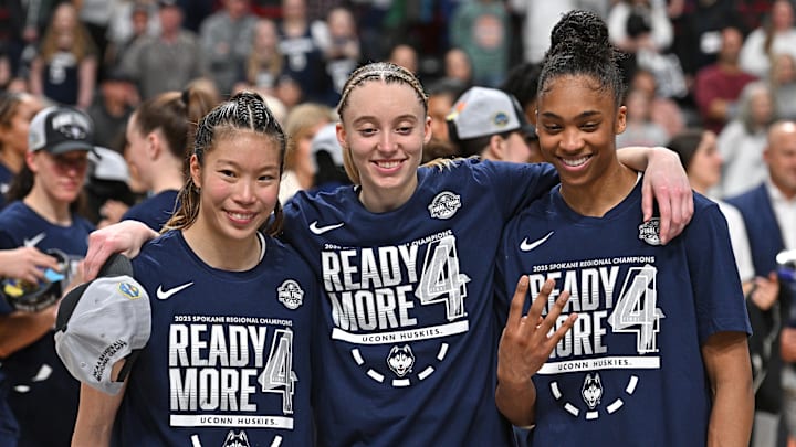 Mar 31, 2025; Spokane, WA, USA; UConn Huskies guard Kaitlyn Chen (20), guard Paige Bueckers (5) and forward Aubrey Griffin (44) pose for a photo after a Elite 8 NCAA Tournament basketball game against the USC Trojans at Spokane Arena. Mandatory Credit: James Snook-Imagn Images Mar 31, 2025; Spokane, WA, USA; UConn Huskies guard Kaitlyn Chen (20), guard Paige Bueckers (5) and forward Aubrey Griffin (44) pose for a photo after a Elite 8 NCAA Tournament basketball game against the USC Trojans at Spokane Arena. Mandatory Credit: James Snook-Imagn Images