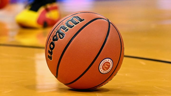 Apr 2, 2024; Houston, TX, USA; A detailed view of the McDonald's All American logo on a basketball during the game between the McDonald's All American East and the McDonald's All American West at Toyota Center. Mandatory Credit: Maria Lysaker-Imagn Images