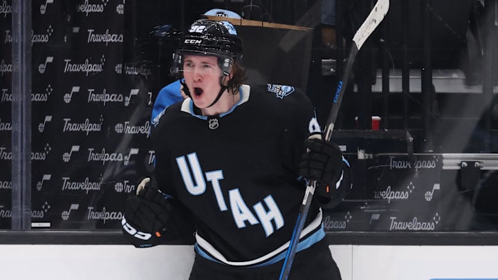 Jan 20, 2025; Salt Lake City, Utah, USA; Utah Hockey Club center Logan Cooley (92) celebrates a goal against the Winnipeg Jets during the second period at Delta Center. Mandatory Credit: Rob Gray-Imagn Images
