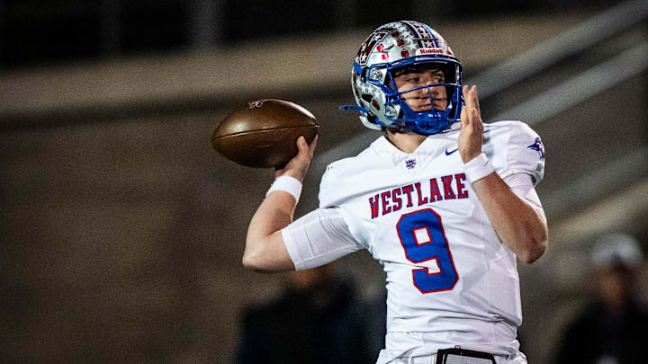 Westlake quarterback Rees Wise (9) looks for a teammate to pass to during the first quarter of the UIL State Championship Playoff Regional Final game against Lake Travis at Kelly Reeves Athletic Complex in Cedar Park, Dec. 6, 2024.