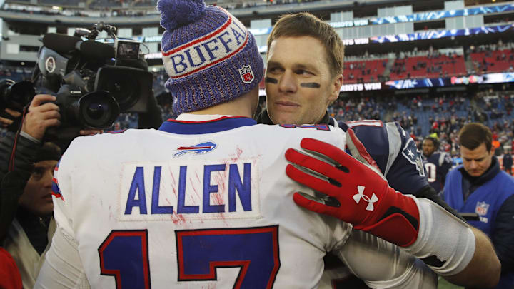 Dec 23, 2018; Foxborough, MA, USA; New England Patriots quarterback Tom Brady (12) meets Buffalo Bills quarterback Josh Allen (17) after the game at Gillette Stadium.