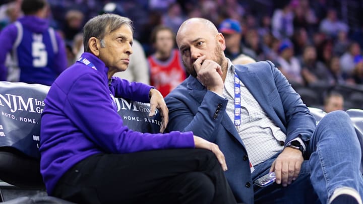 Dec 13, 2022; Philadelphia, Pennsylvania, USA; Sacramento Kings owner Vivek Ranadive (L) and general manager Monte McNair (R) talk during warm ups before a game against the Philadelphia 76ers at Wells Fargo Center. 