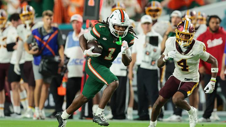 Sep 26, 2026; Miami Gardens, Florida, USA; Miami Hurricanes wide receiver Malachi Toney (1) runs with the football against Central Michigan Chippewas defensive back Jaion Jackson (4) during the third quarter at Hard Rock Stadium. Mandatory Credit: Sam Navarro-Imagn Images Sep 26, 2026; Miami Gardens, Florida, USA; Miami Hurricanes wide receiver Malachi Toney (1) runs with the football against Central Michigan Chippewas defensive back Jaion Jackson (4) during the third quarter at Hard Rock Stadium. Mandatory Credit: Sam Navarro-Imagn Images