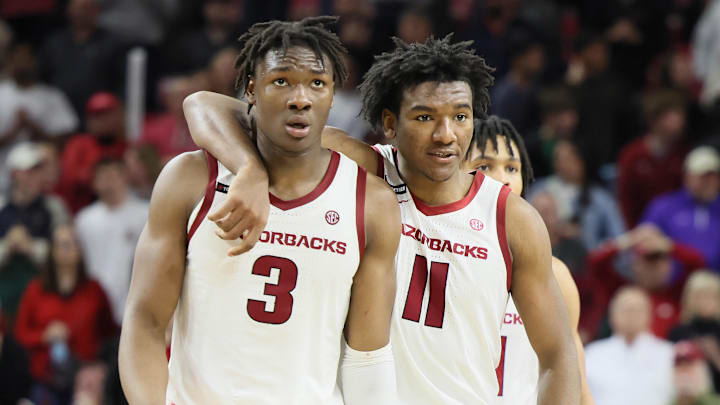 Jan 22, 2025; Fayetteville, Arkansas, USA; Arkansas Razorbacks forwards Adou Thiero (3) and Karter Knox (11) celebrate after a play int he second half against the Georgia Bulldogs at Bud Walton Arena. Arkansas won 68-65. Mandatory Credit: Nelson Chenault-Imagn Images