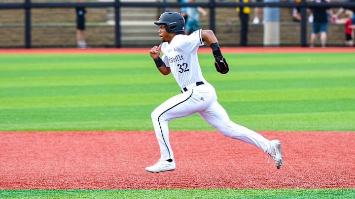 Louisville baseball catcher/outfielder Zion Rose (32)